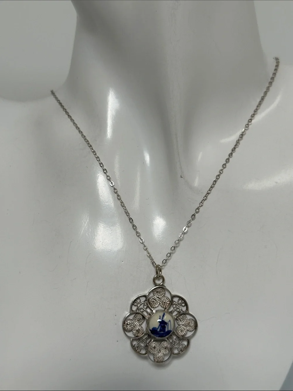 Sterling Silver Floral Filigree Pendant with Porcelain Blue Accent Necklace​